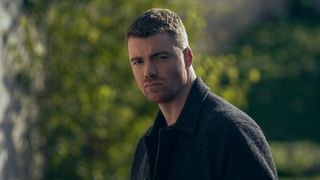 Gabriel Basso, looking mean and moody as Peter Sutherland in The Night Agent season 3.