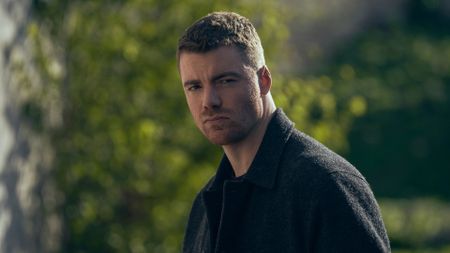 Gabriel Basso, looking mean and moody as Peter Sutherland in The Night Agent season 3.