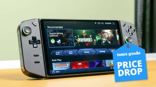 Lenovo Legion Go standing on table with Tom's Guide Price Drop badge