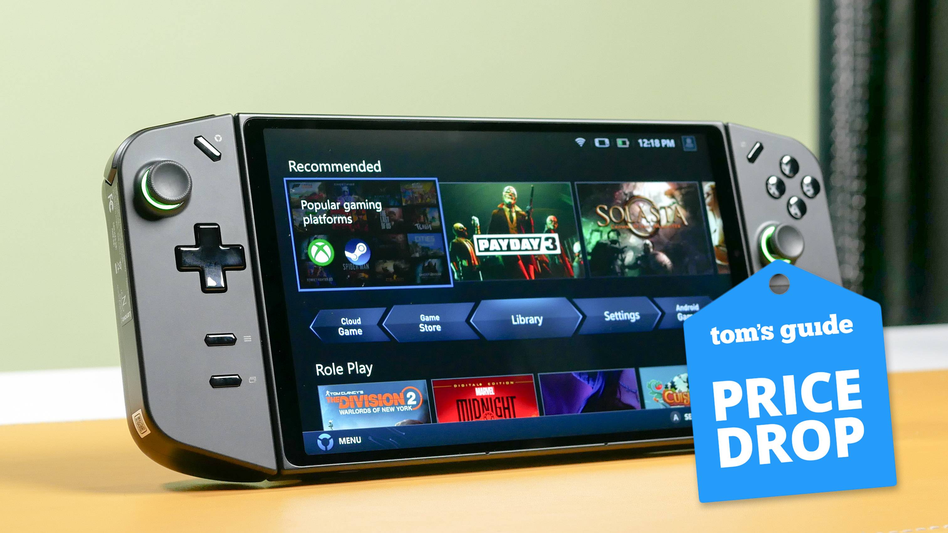 Lenovo Legion Go standing on table with Tom's Guide Price Drop badge