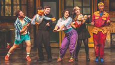 Actors controlling puppets in Avenue Q