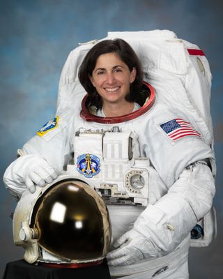 An official portrait of NASA astronaut Nicole Stott.