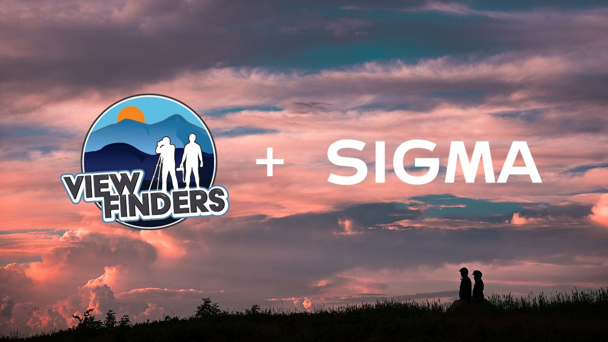 The View Finders and Sigma Logo is displayed over a photo of sunset