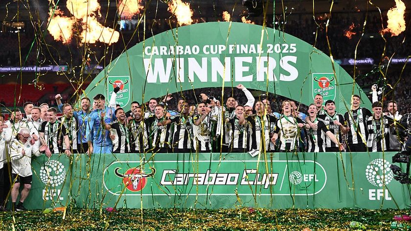The Newcastle United squad and members of the coaching staff celebrate in a team picture after the Carabao Cup Final between Liverpool and Newcastle United at Wembley Stadium on March 16, 2025 in London, England.