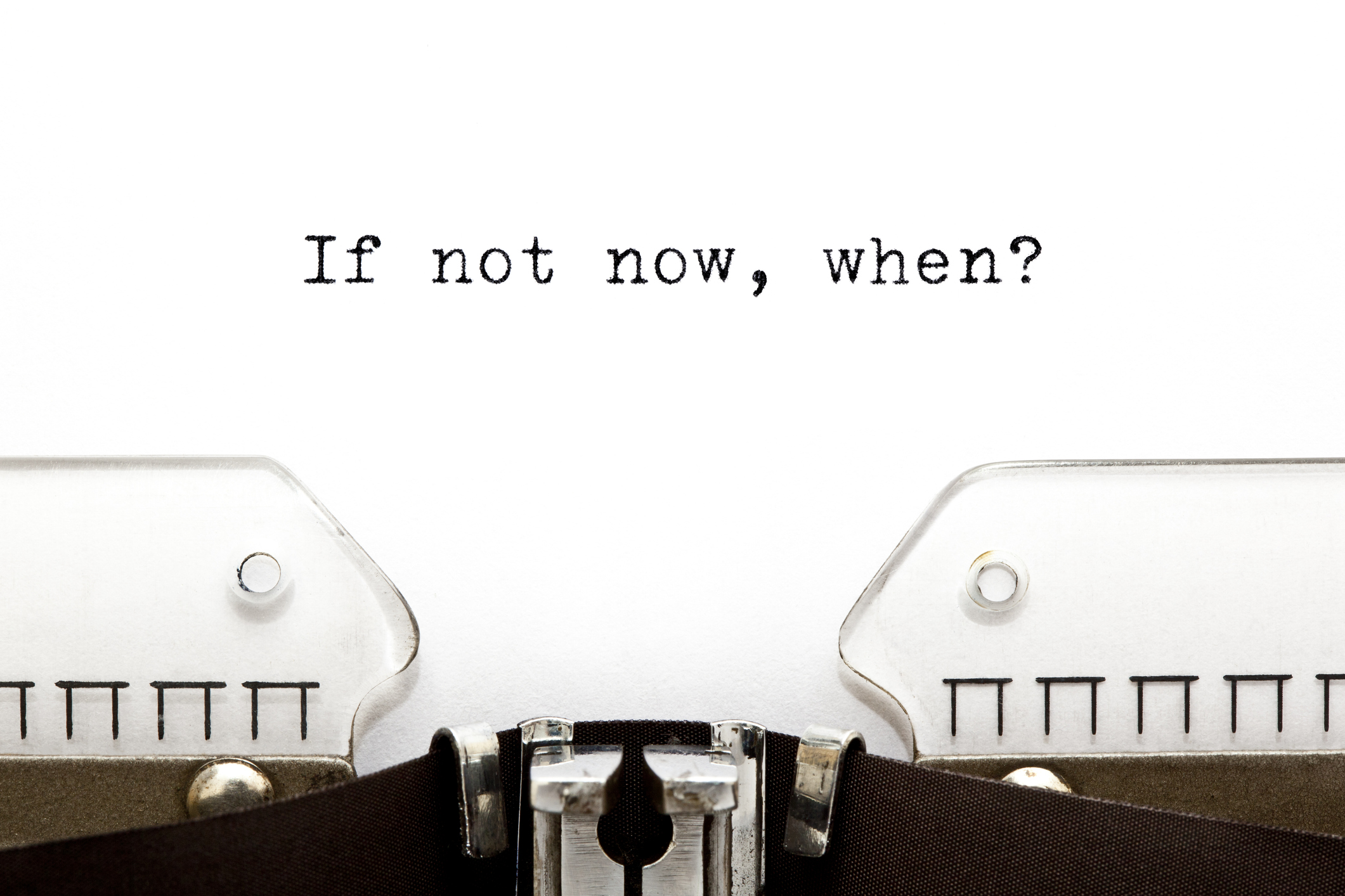 Concept image with If Not Now, When printed on an old typewriter.