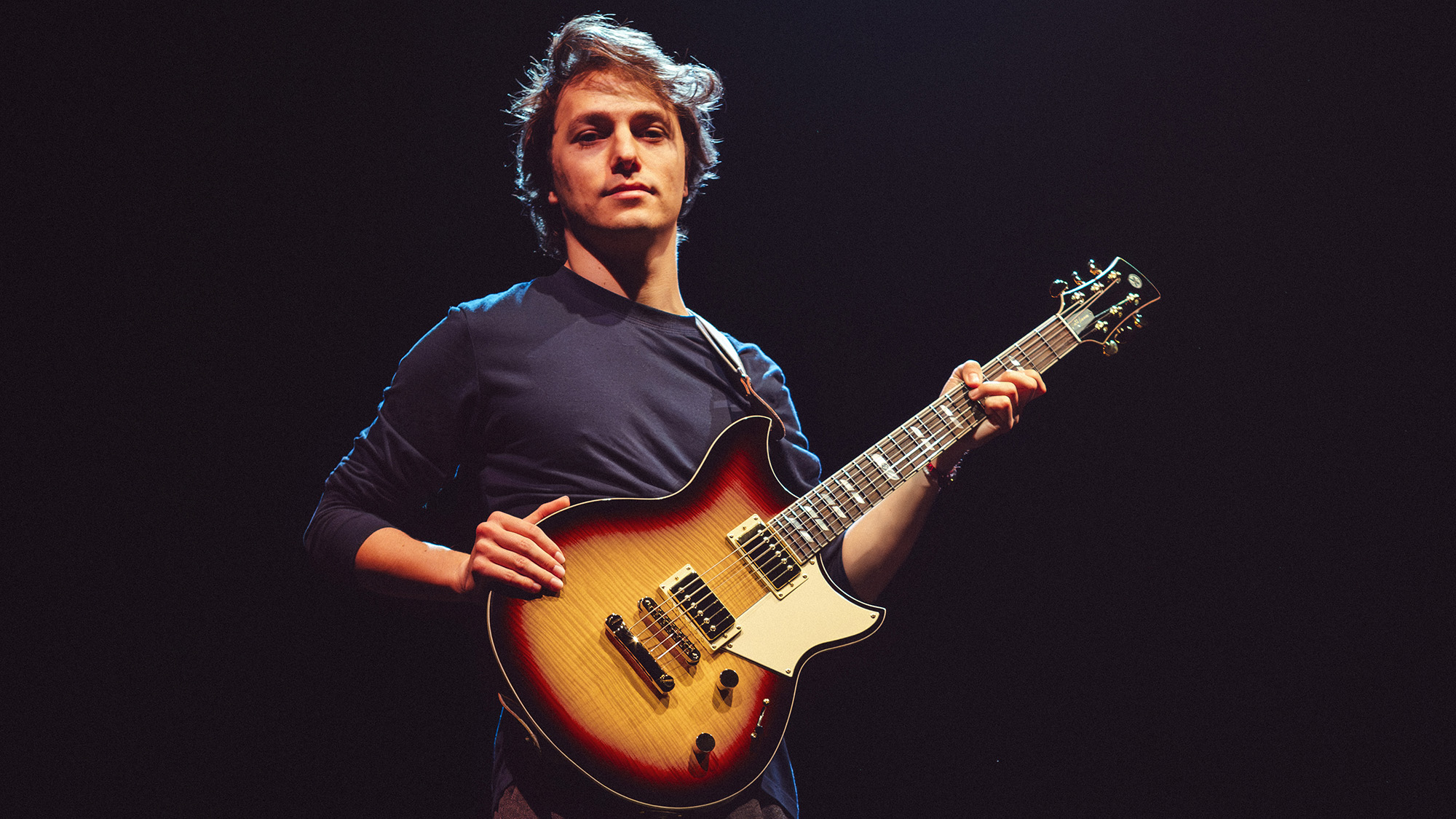 Matteo Mancuso poses with his signature Yamaha Revstar