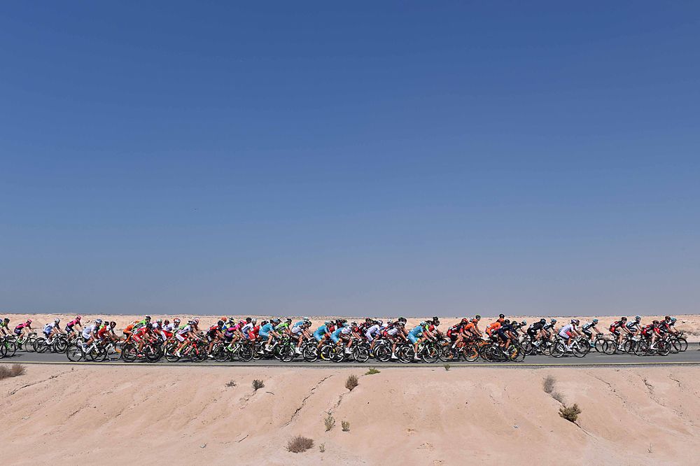 The field passes the desert landscape in Dubai