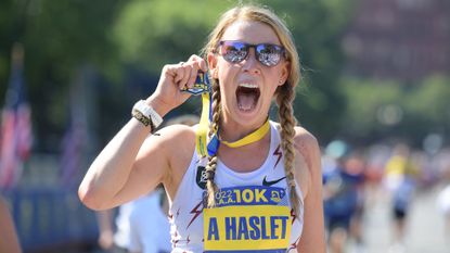 BOSTON, MA - JUNE 26: Adrianne Haslet, of Massachusetts, and a Boston Marathon bombing survivor, reacts to winning the Para T61-T64 division of the B.A.A. 10K on June 26, 2022, on Charles Street in Boston, MA. Haslet finished with a time of 1:15:19. (Photo by Erica Denhoff/Icon Sportswire via Getty Images)