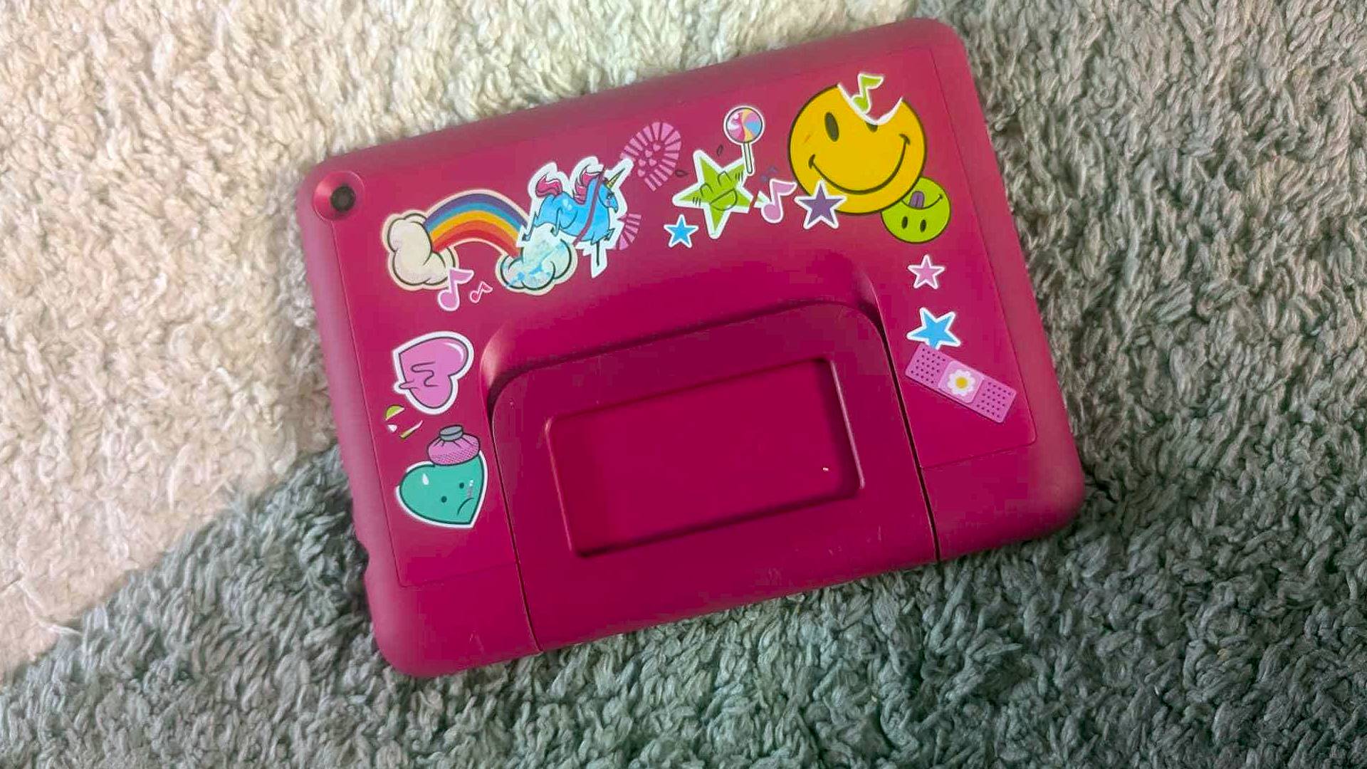 Back of Fire HD 8 Kids Pro with pink sticker-themed bumper case.