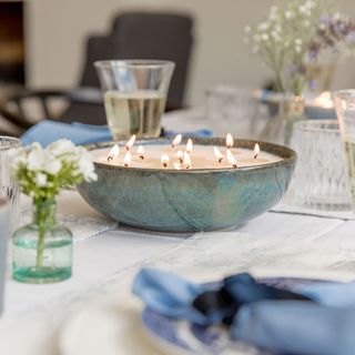 keep candles in bowl on table