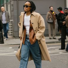 woman wearing layered jackets
