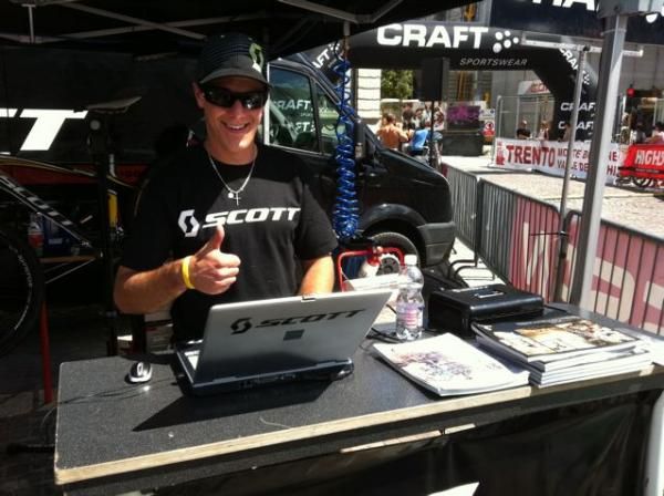 Fabien at the Scott booth checks in every bike, for eight days straight, with smile!