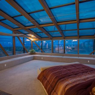 bedroom with glass wall