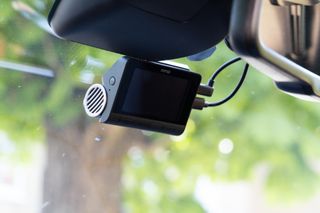 70mai A810 dashcam attached to a car windscreen