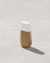 Fenty Beauty, Eaze Drop Blurring Skin Tint $29.50 | £25