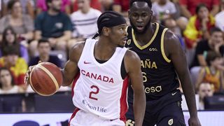Shai Gilgeous-Alexander of the Canada Men's National Basketball Team dribbles the ball ahead of the Canada vs France FIBA Basketball World Cup clash. 