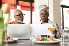 Older couple looking over documents