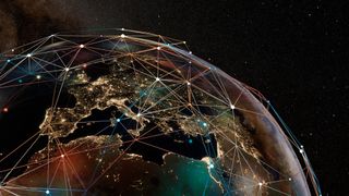 A digital representation of the globe with Europe, Africa and Asia visible and their cities lit up by lights at night. A digital grid above the globe connects countries to one another