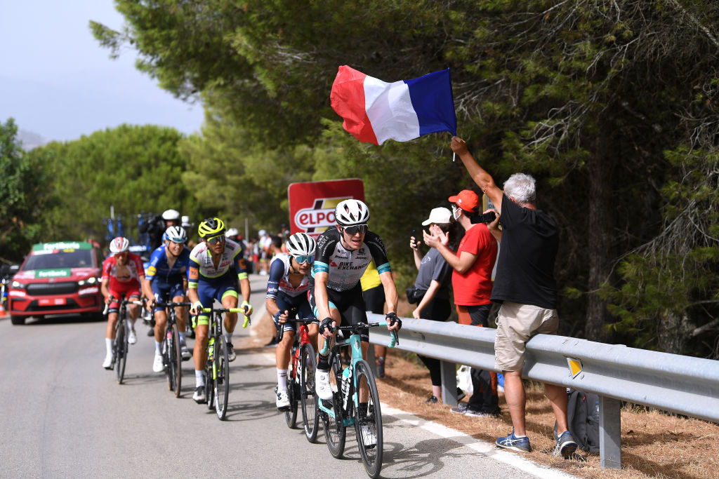 RINCON DE LA VICTORIA SPAIN AUGUST 24 LR Kenny Elissonde of France and Team Trek Segafredo and Nicholas Schultz of Australia and Team BikeExchange in the Breakaway while fans cheer during the 76th Tour of Spain 2021 Stage 10 a 189km stage from Roquetas de Mar to Rincn de la Victoria lavuelta LaVuelta21 on August 24 2021 in Rincon De La Victoria Spain Photo by Tim de WaeleGetty Images
