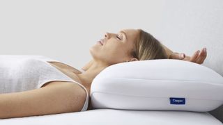 Woman resting on Casper Hybrid Pillow