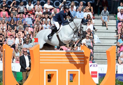 Ben Maher rides Cella into silver medal position at the 2013 European Championships