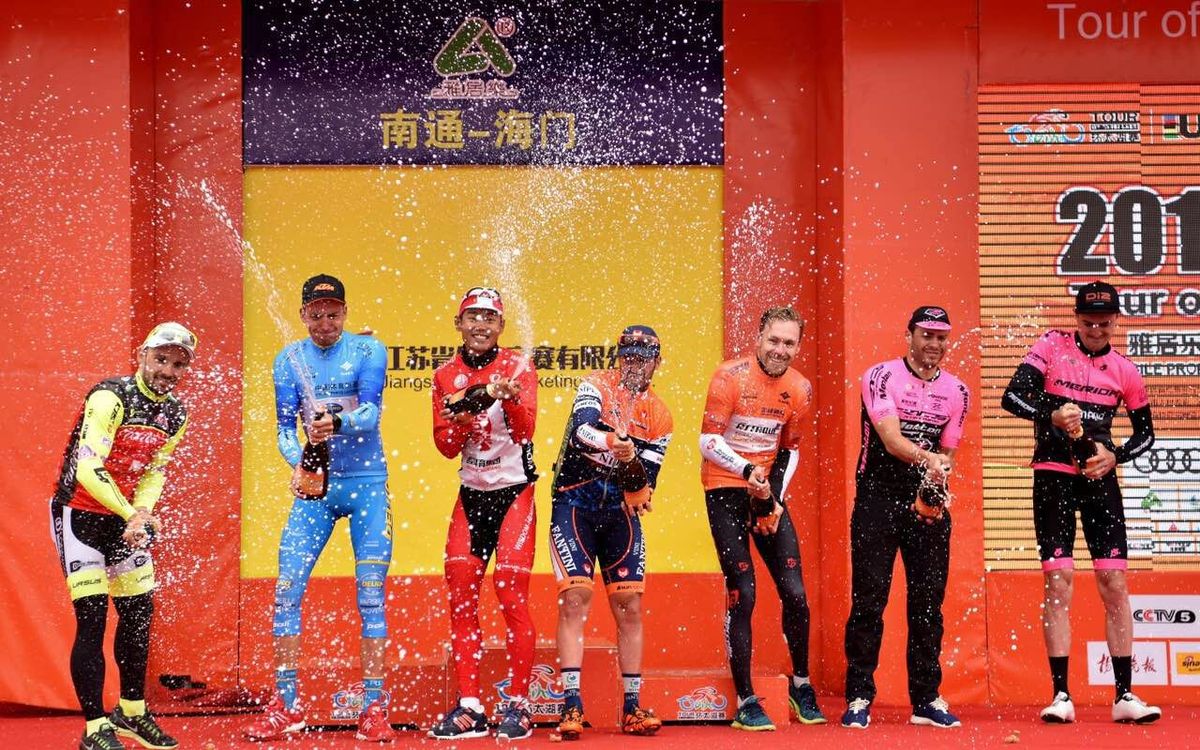 Champagne corks flying on the podium