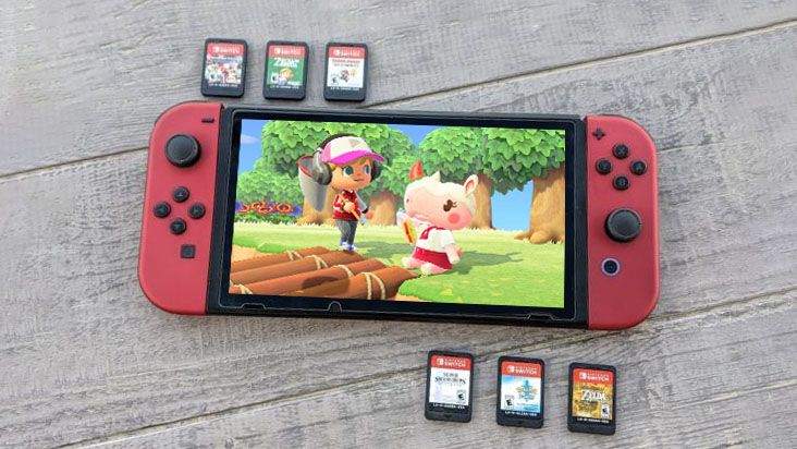 Nintendo Switch with Animal Crossing on screen and cartridges around it. 