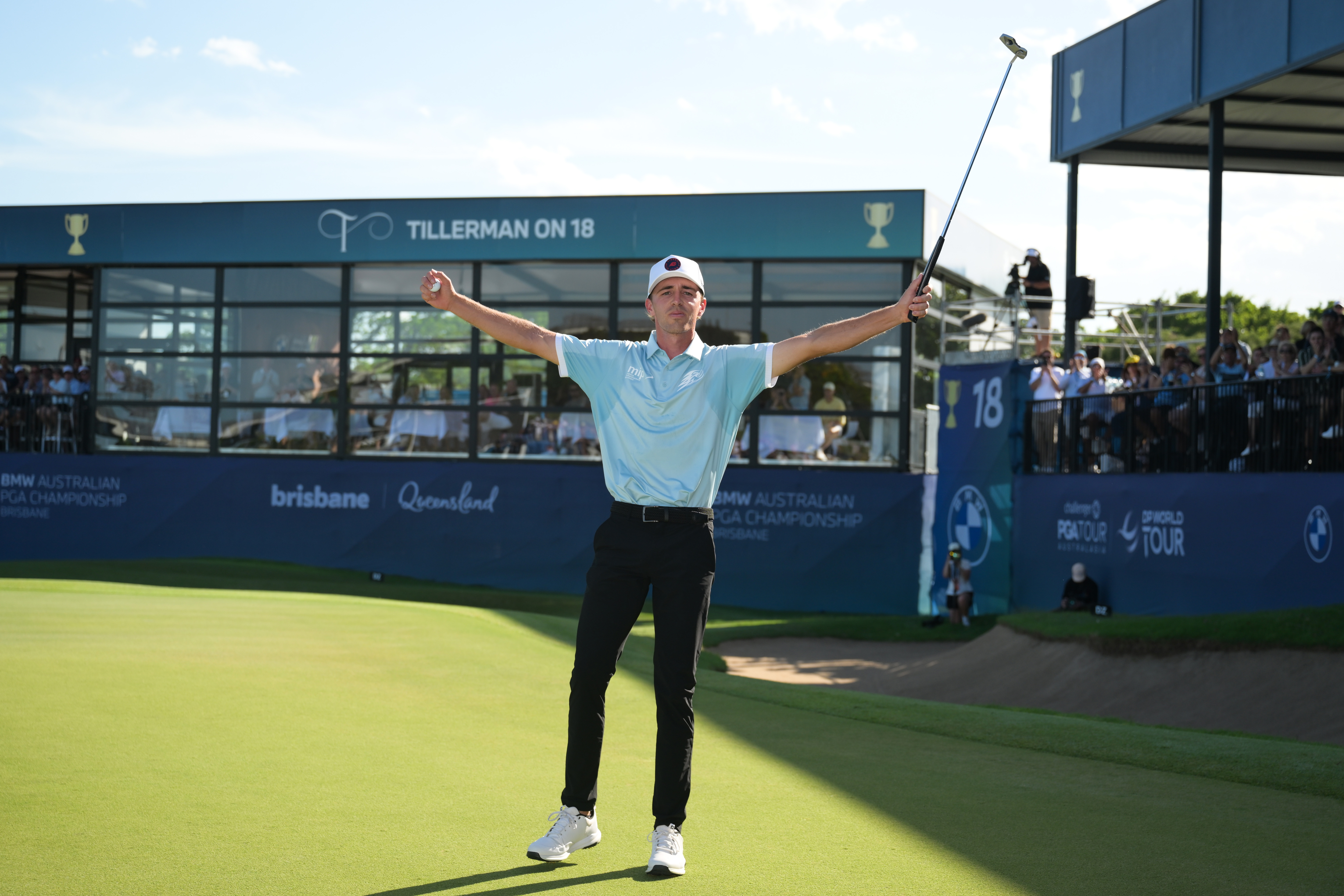 David Puig raises his hands in the air after winning the BMW Australian PGA Championship