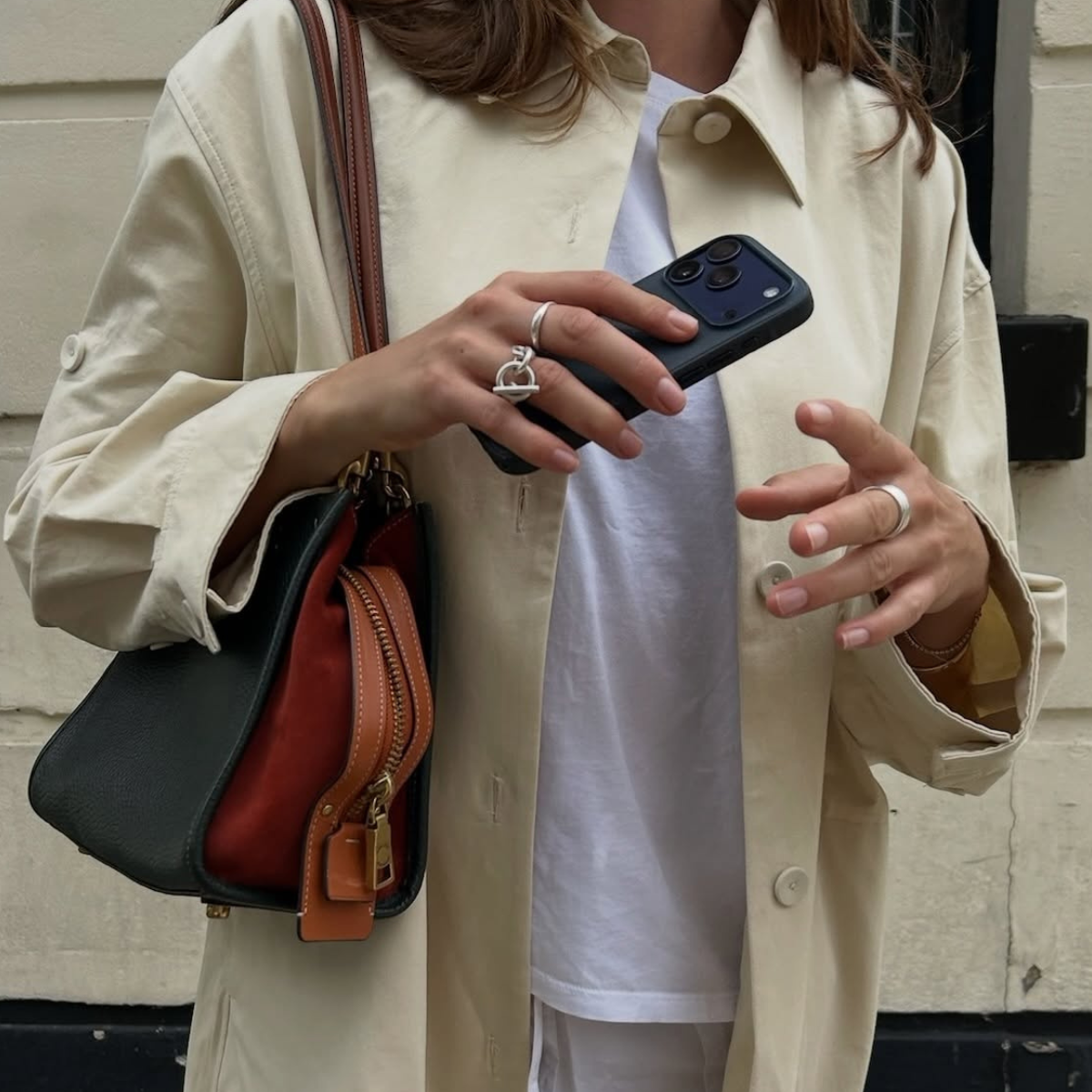 An image of a woman wearing fall essentials 2026
