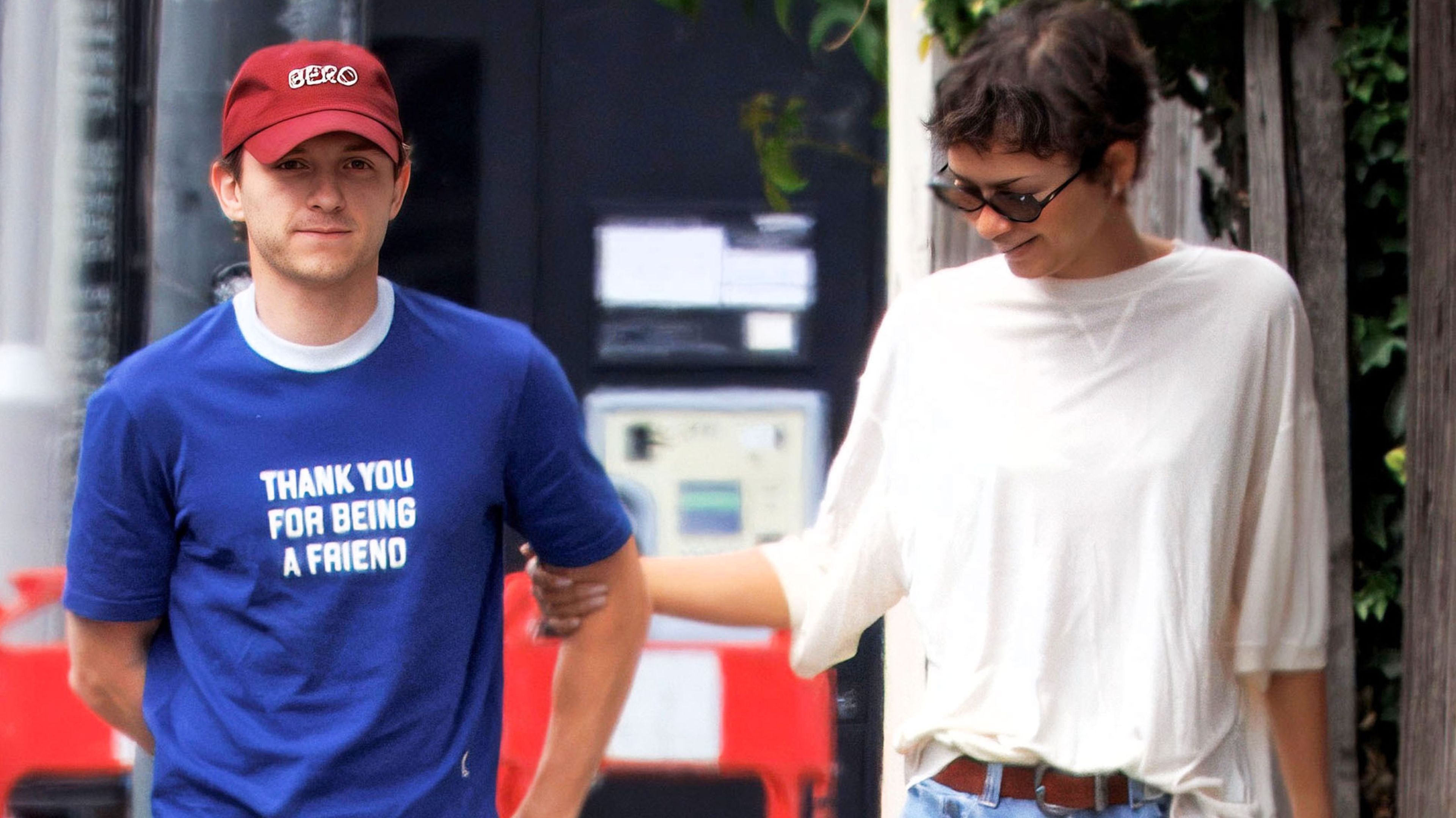 Zendaya and Tom Holland photographed wearing matching wedding rings whilst walking dogs in London, UK.