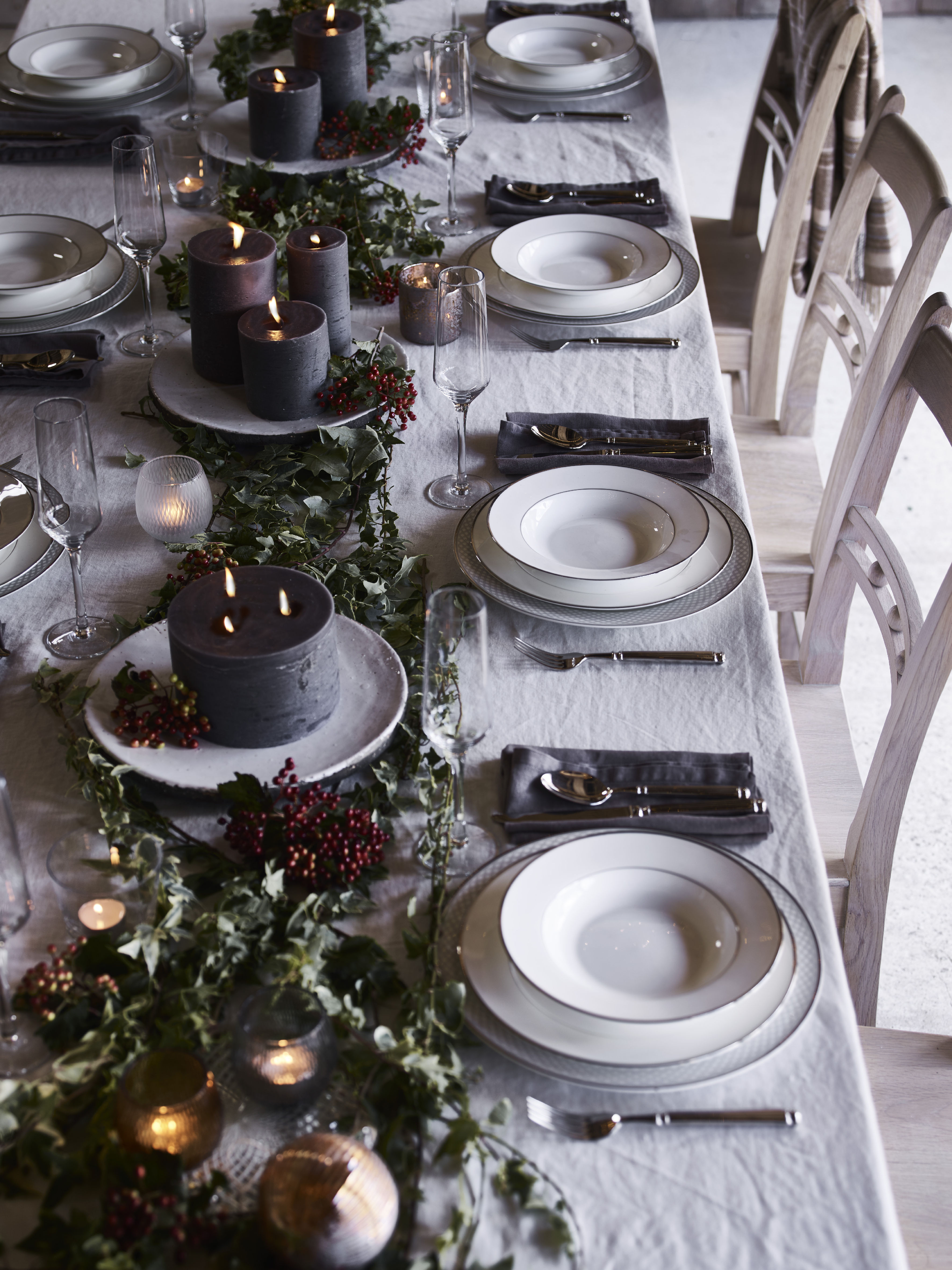 Christmas table with dark candles