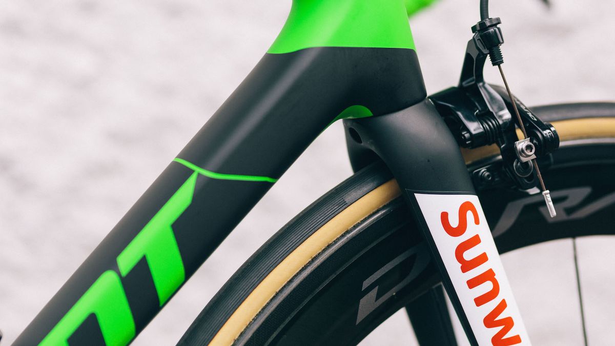 Green detailing throughout the bike