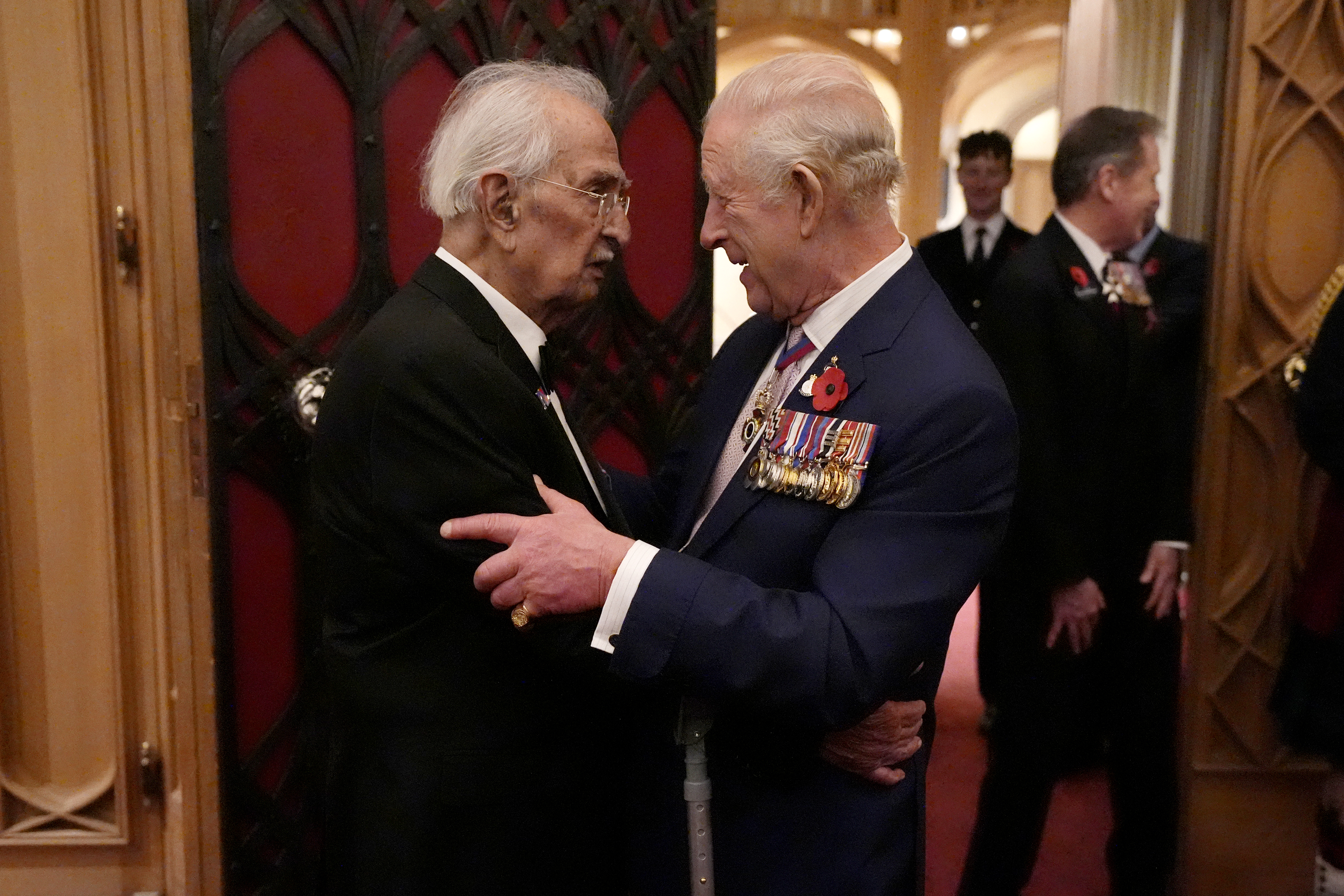 King Charles hugging a veteran