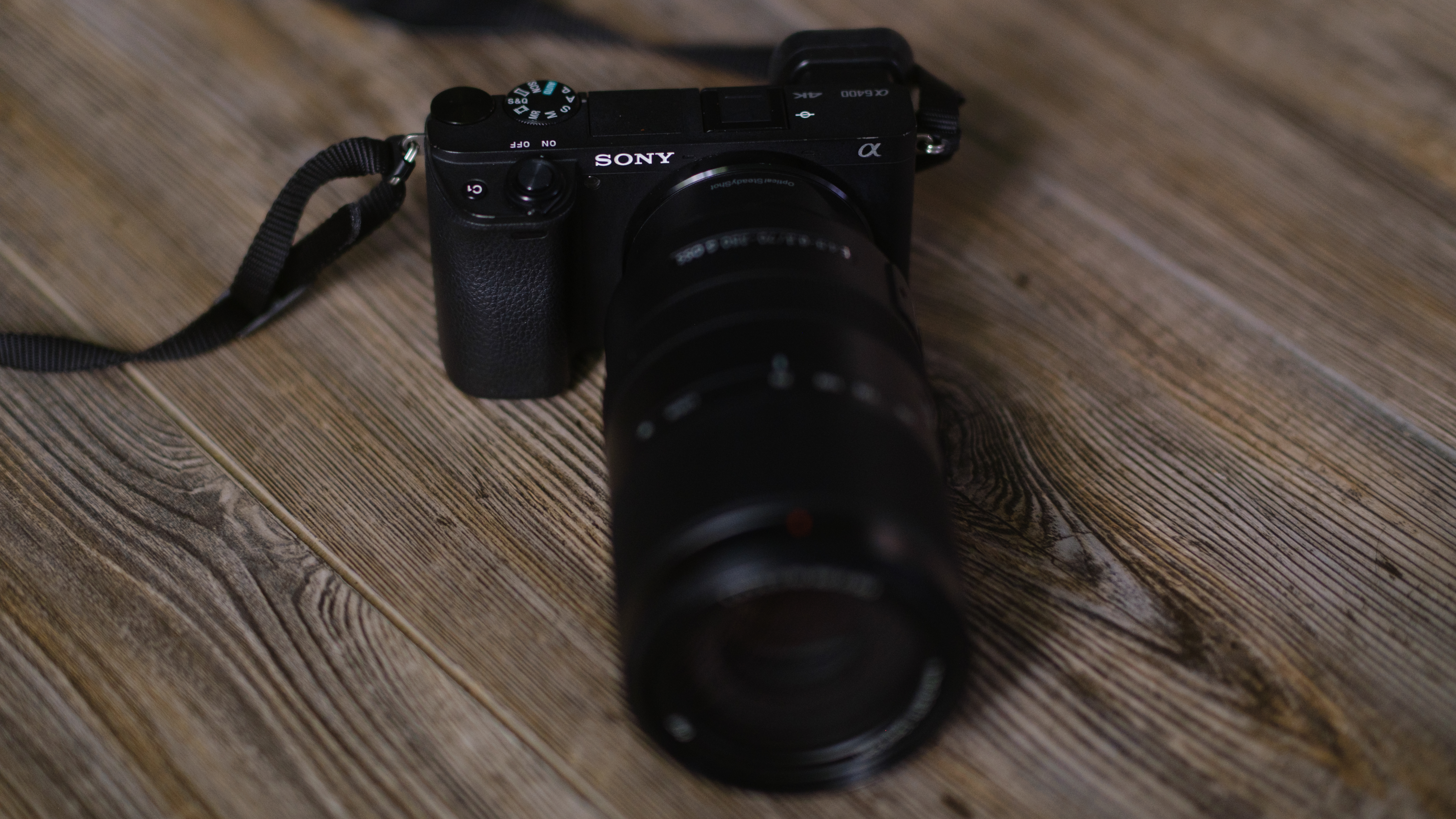 The Sony a6400 on a wood surface