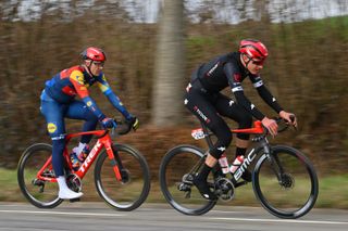 KUURNE, BELGIUM - FEBRUARY 25: (L-R) Edward Theuns of Belgium and Team Lidl-Trek and Petr Kelemen of Czech Republic and Tudor Pro Cycling Team compete during the 76th Kuurne - Bruxelles - Kuurne 2024 a 196.4km one day race from Kortrijk to Kuurne on February 25, 2024 in Kuurne, Belgium. (Photo by Luc Claessen/Getty Images)