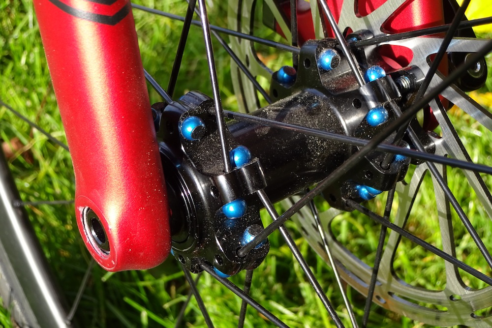 Cole's wheels have an unusual hub/spoke design and run on thru axles