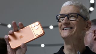 Tim Cook with iPhone 17 Pro Max