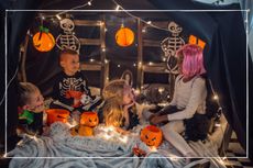 Halloween party ideas illustrated by kids sat in halloween costumes sat in home made spookey den