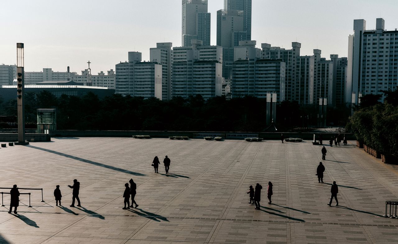 Front view of buildings and a open walking area