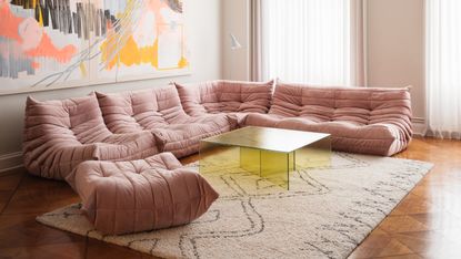 Pink slouchy sectional sofa in living room