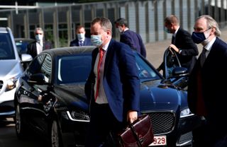 Britain's chief Brexit negotiator David Frost (C) arrives to meet his EU counterpart for Brexit negotiations at the EU headquarters in Brussels on September 17, 2020. - The chief negotiators