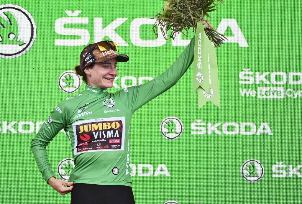Team Jumbo Vismas Dutch rider Marianne Vos celebrates her sprinters green jersey on the podium after the 8th and final stage of the new edition of the Womens Tour de France cycling race 1233 km between Lure and La Super Planche des Belles Filles on July 31 2022 Photo by Jeff PACHOUD AFP Photo by JEFF PACHOUDAFP via Getty Images