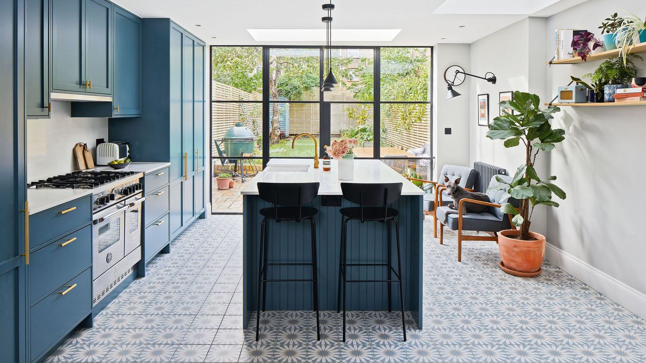 A modern kitchen with geometric patterned floor tiles