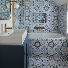 tiled bathroom in blue and white