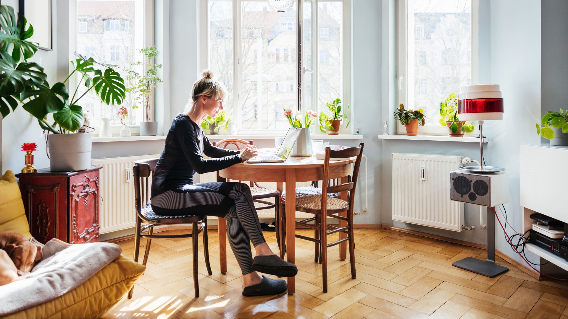 Woman sitting down at table