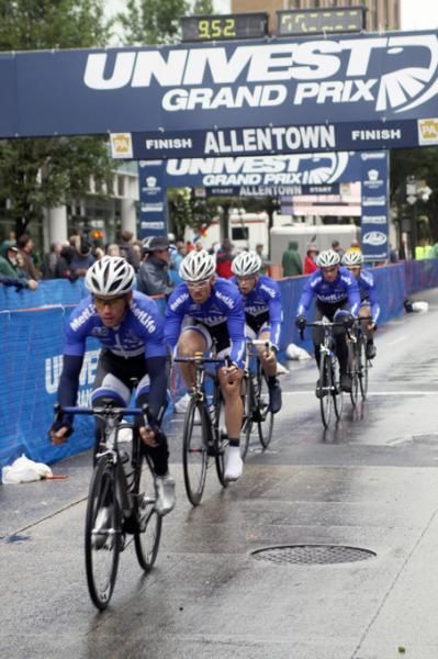 Metlife Cycling Team go under the Univest banner at the start line with one lap to go on the 12k circuit.