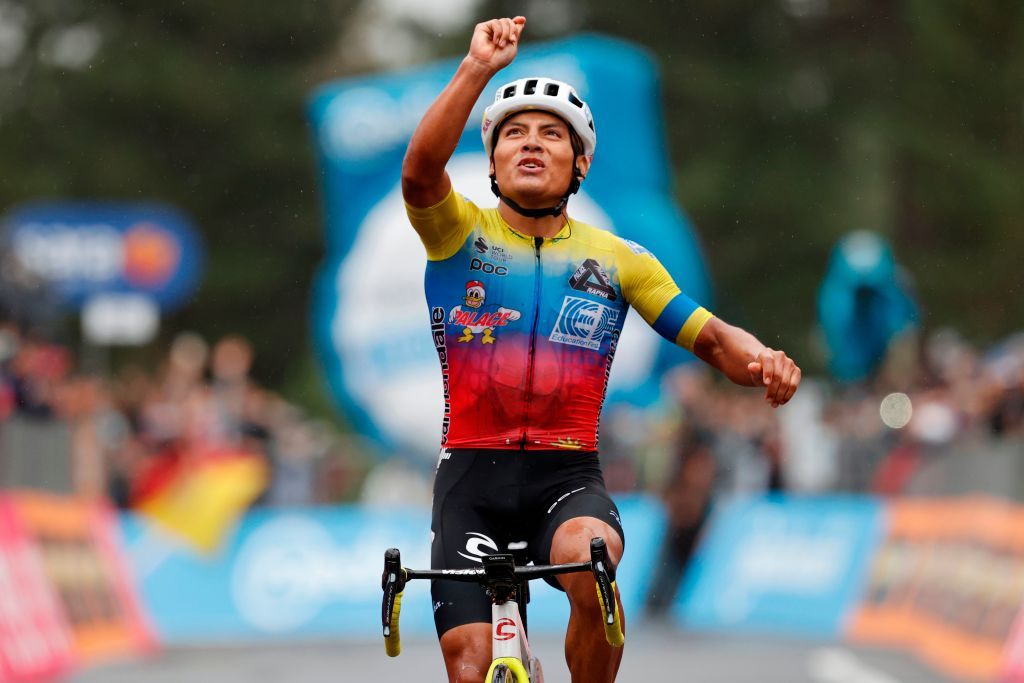 Team Education First rider Ecuadors Jonathan Caicedo celebrates as he crosses the finish line to win on October 5 2020 the 3rd stage of the Giro dItalia 2020 cycling race a 150kilometer route between Enna and volcano Etna LinguaglossaPiano Provenzana Sicily Photo by Luca Bettini AFP Photo by LUCA BETTINIAFP via Getty Images