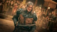 Dolph Lundgren as a Witcher holding a sword