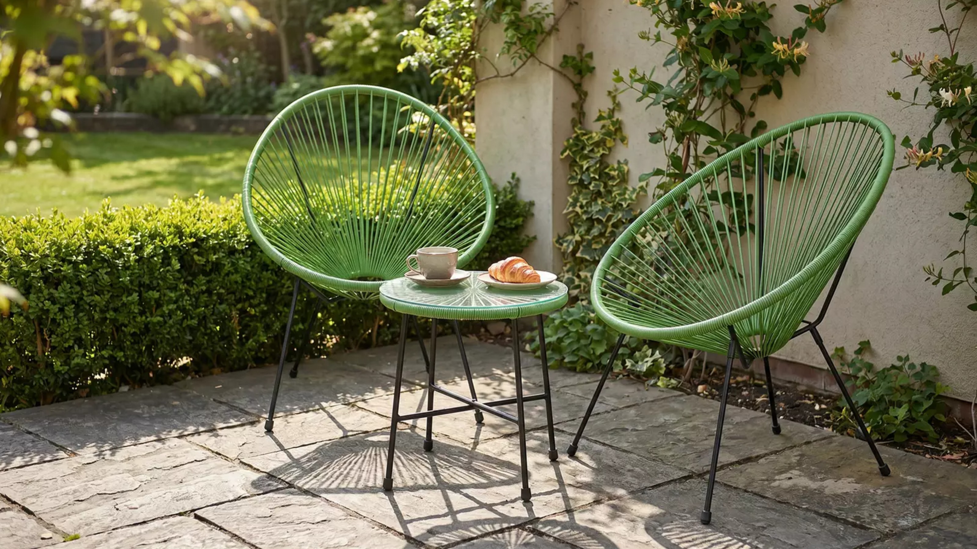 Argos Home Serenity 2 Seater Metal Garden Bistro Set on a patio