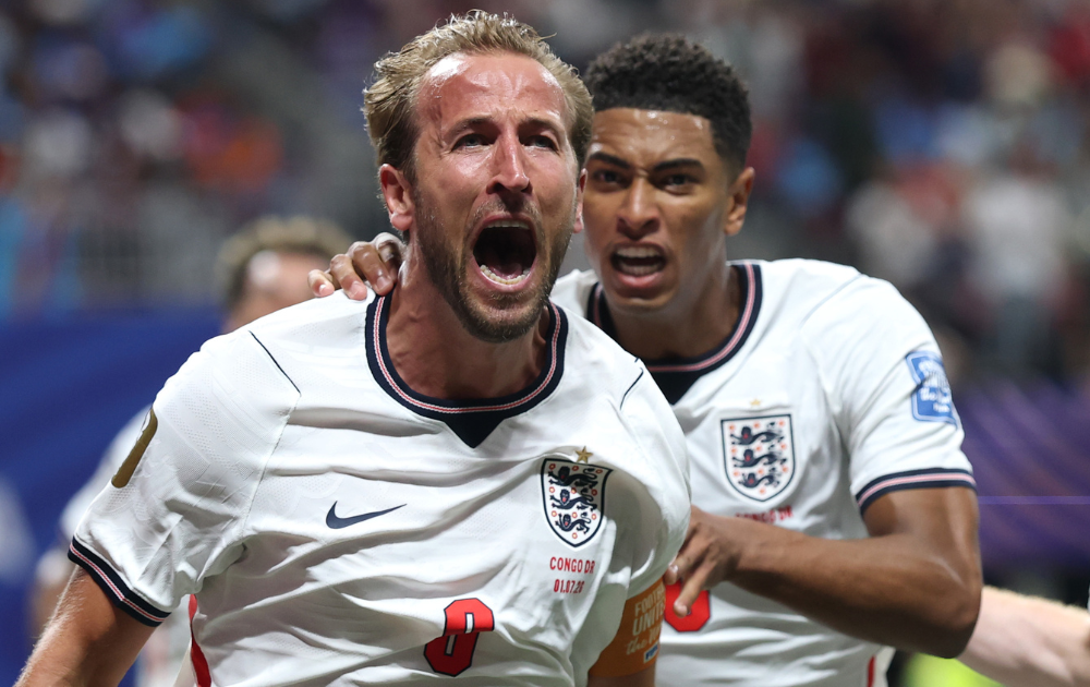 Harry Kane #9 of England celebrates with teammate Jude Bellingham #10 after scoring his team's first goal during the FIFA World Cup 2026 Round Of 32 match between England and Congo DR